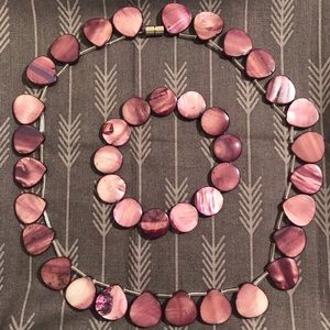 Purple stone necklace and bracelet set.